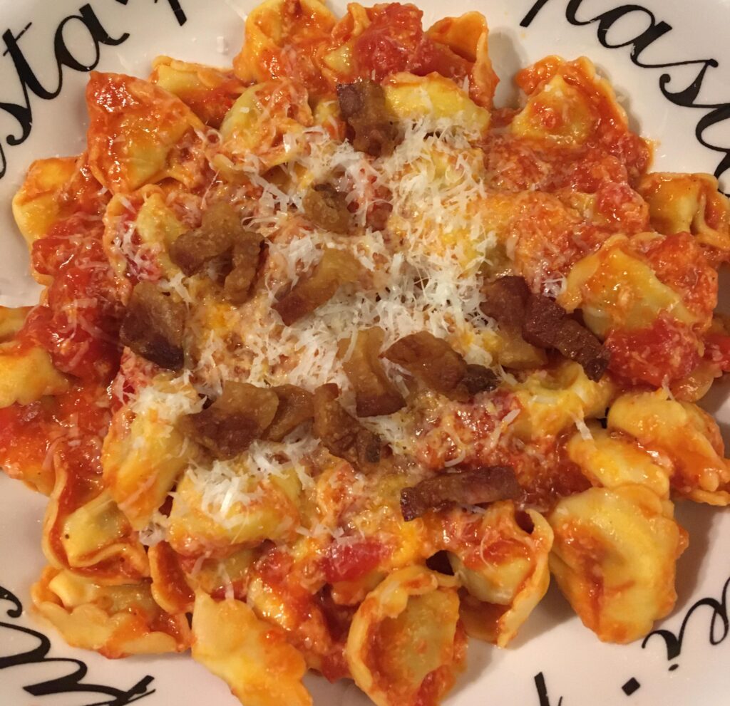 Tortellini with San Marzano tomatoes and guanciale