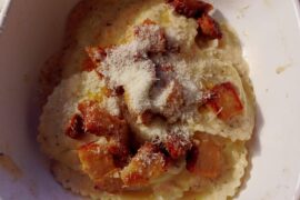 Lemon ricotta girasoli with a white sauce made from bacon grease, ricotta, cheese sauce olive oil and some spices topped off with said bacon and pecorino