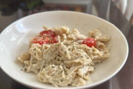 [Guess who back with pasta!] Penne Rigatti with custom white sauce (mozzarella and Parmesan cheese, flavored with stir fried red onion and garlic), [again] topped with cherry tomatoes and parsley and grated Parmesan cheese.