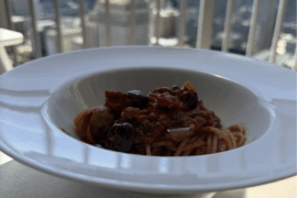 Spaghetti Puttanesca.  Green and black olives, garlic, onion, capers ,anchovies (chunky)