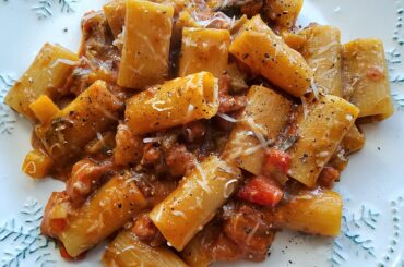 Rigatoni in a salsiccia, pancetta and vegetable ragù