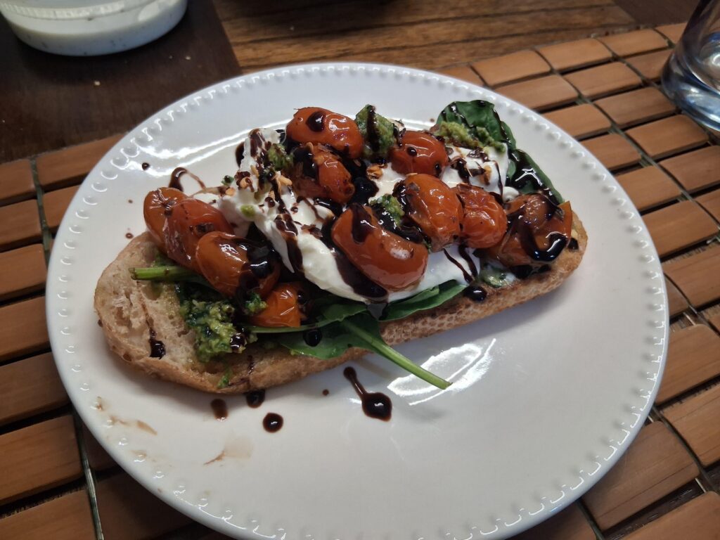 Homemade Bruschetta Caprese with roasted cherry tomatoes