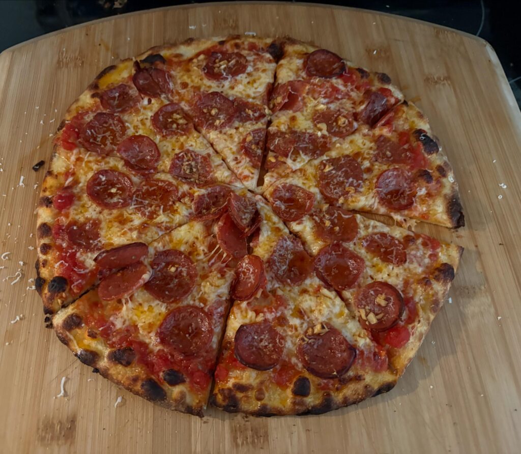 Day 136 of making pizza every day. Pepperoni and Garlic.