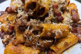 Rigatoni with beef, carrots, red onion, commandaria, pancetta, and parmigano