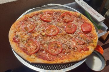 pizza on a sunny day