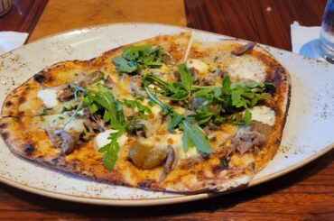 Duck confit and honey-raisin flatbread