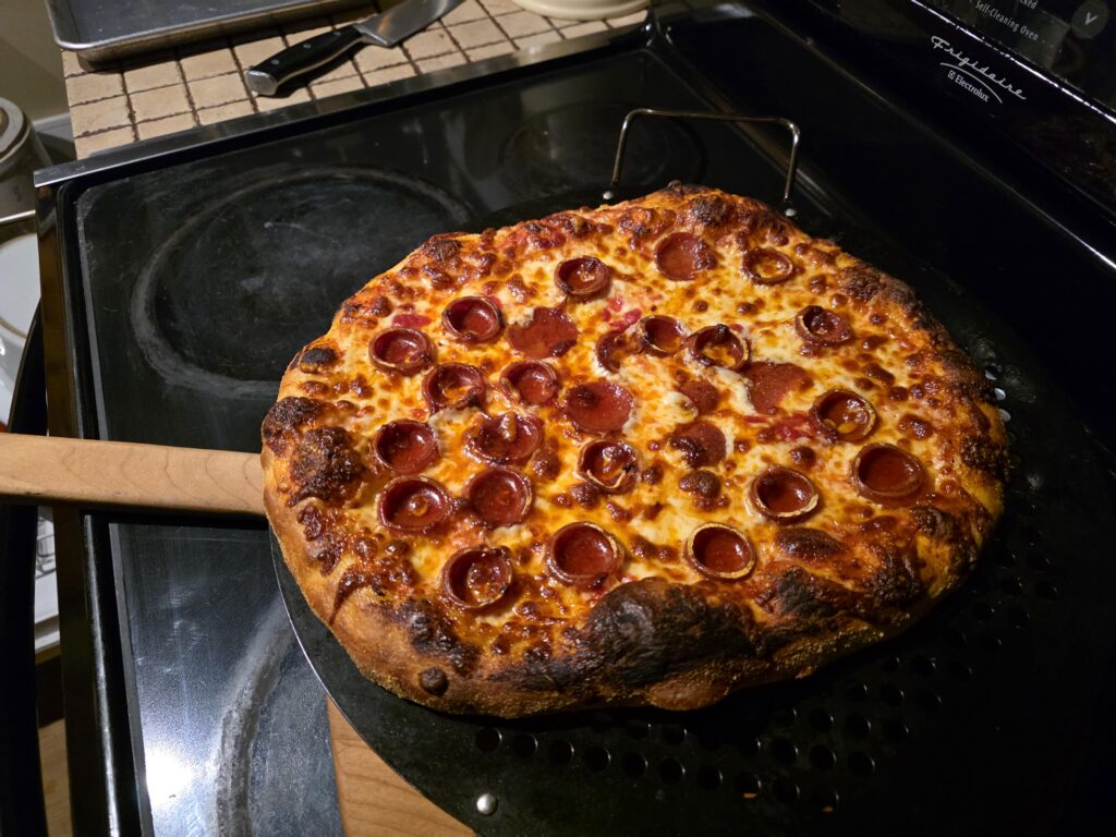 Tried Dave's Pizza Oven 1 day dough recipe and a cheddar/mozzarella blend (shredded myself) and it was amazing!