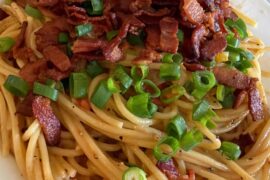 Spaghetti with bacon and Brie cheese.