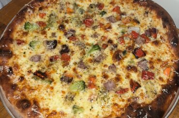 Made a 16 in. NY style pizza in my apartment oven. It’s got veggies on it, so it’s like healthy.