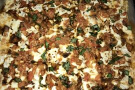 Bruschetta pie with a balsamic glaze and fresh mutz