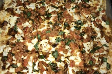 Bruschetta pie with a balsamic glaze and fresh mutz