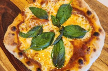 Margherita. Weber grill with a pizza steel, cherry wood smoked. Best pizza I've ever made.