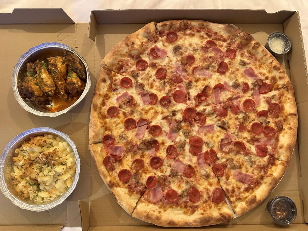 Ordered this delicious pizza while in Las Vegas. No clue where it was from but it was so incredibly massive and good!