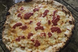 What temp is ny style pizza cooked