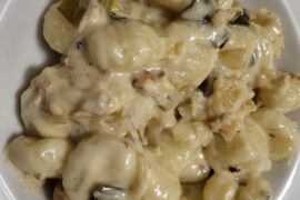 Gnocchis with castelmagno cream, leek and walnut