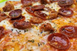 My latest attempt. Spicy pepperoni and hot, Italian Sausage.