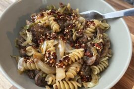 Rotini with cabbage, onions, mushrooms, and sausage