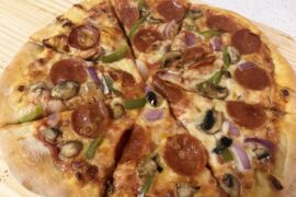 Pepperoni, green pepper, red onion, mushrooms