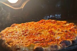 Roni Sourdough Pizza with shaved garlic, shaved onions and Calabrian chilies 🌶️ baked in kitchen aid oven 500° convection roast & on a skinny griddle baking steel