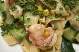 Fettuccini, shrimp, langoustine tails, zucchini, grilled corn, garlic + olive oil, parsley, Calabrian red pepper