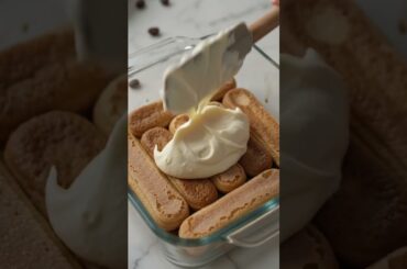Creamy, coffee-infused Italian Tiramisu made with mascarpone, espresso ladyfingers, and cocoa.