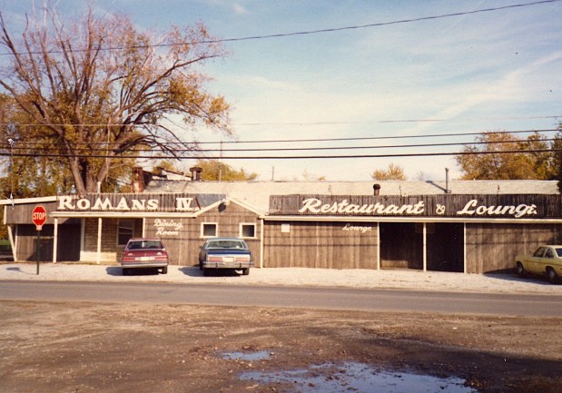 This exterior photo of Romans IV Restaurant and Lounge was taken in 1984. The building's outdoor signage looks much different today. Located at 1409 Hubbard Road in Madison Township, Romans IV is celebrating its 50th anniversary in 2026. The eatery has become prominent for the chicken wings that have been served since it opened in 1976. Other popular menu items are its Italian cuisine and lineup of weekend specials, which always includes all-you-can-eat crab legs. (Courtesy of Ken Gauntner)