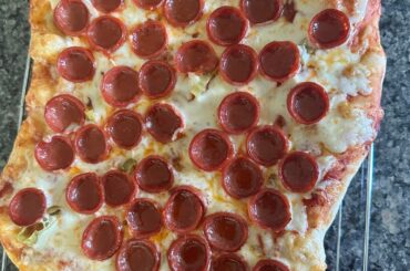Another pizza made using a preheated upside-down baking tray