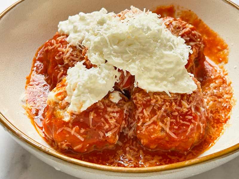 chicken meatballs with sauce and cheese