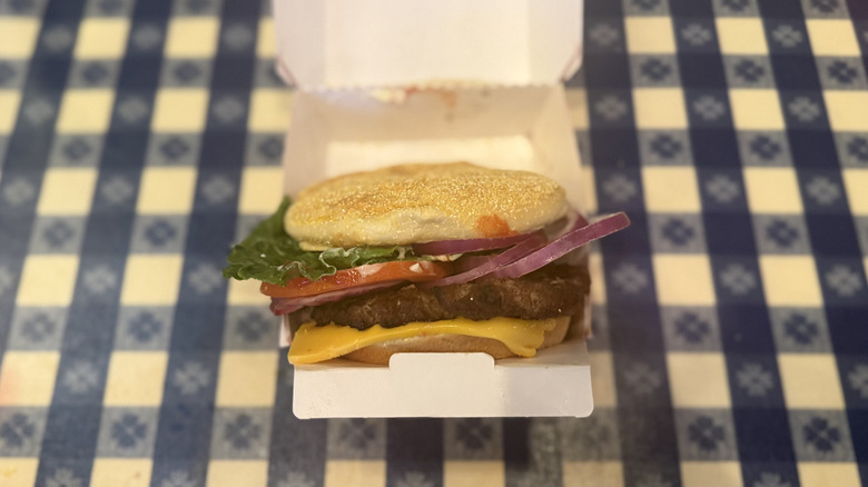 Portillo's char-broiled cheeseburger in to-go container.