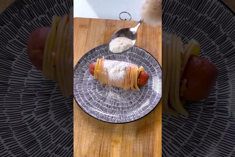 Adorable Cooking Cat Whips Up a Tasty Italian Hotdog!