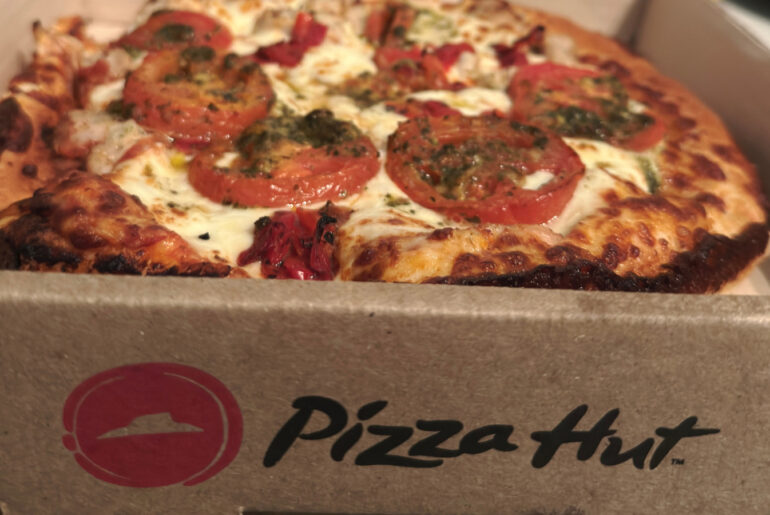 What Pizza Hut's Iconic Stuffed Crust Pizza Cost In The '90s Vs 2026