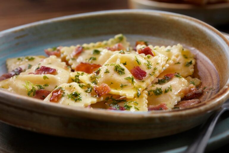 5 Italian Chains With the Best Ravioli and Garlic Bread, According to Diners — Eat This Not That