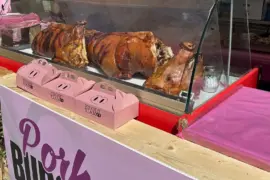 Even the slaughtered pigs seem happy at the porchetta fest/ Photos by Philip Graitcer