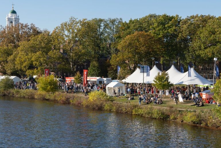 Food vendors and retail booths line the banks of the Charles River each year for the Head of the Charles Regatta.