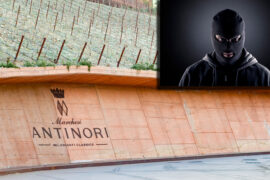 masked thief next to Antinori winery sign in Tuscany, Italy