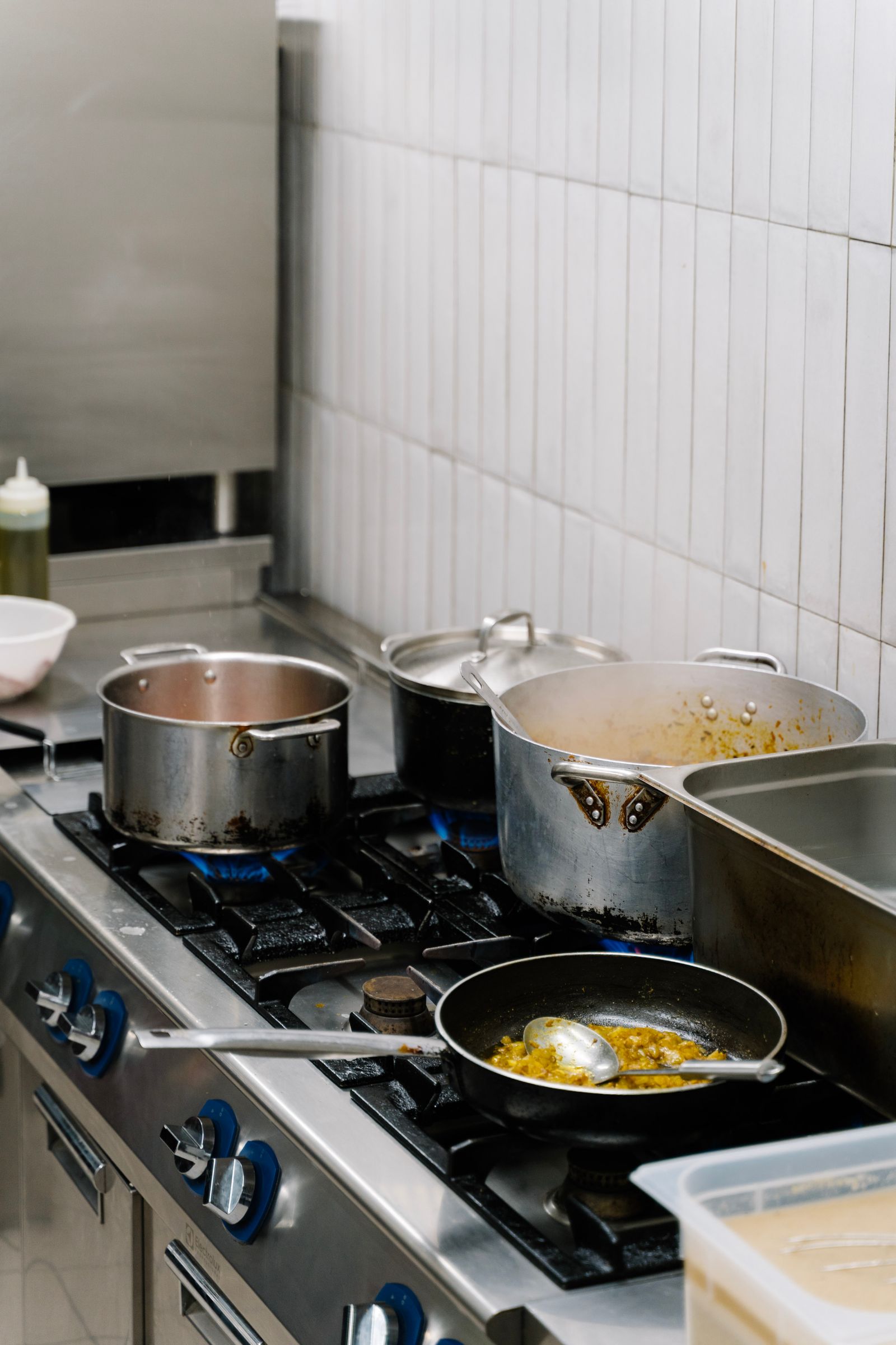 Image may contain Cooking Pot Cookware Food Pot Cooktop Indoors Kitchen and Cooking Pan